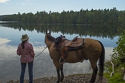 A Horse Country Campground Camper with Her Horse at Voyageur Bay