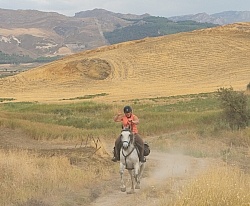 Cantering on the Coast to Coast Ride in Sicily