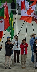 Belinda Trussell Proudly displays the Canadian Flag at the Opening Ceremonies