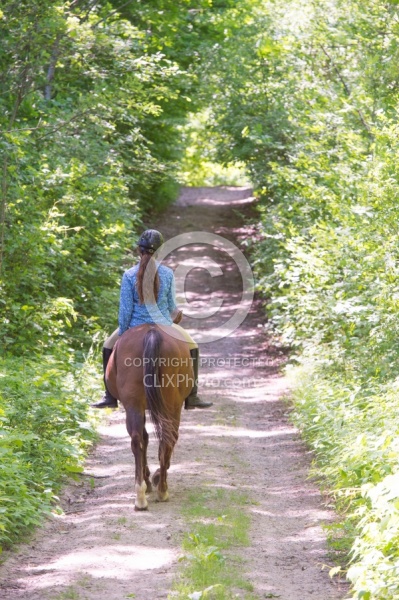 Young Girl Trail Riding Bareback